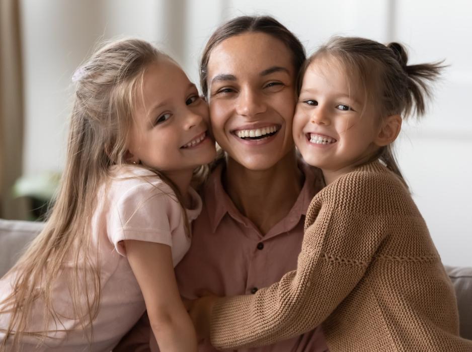 tacoma mom with two daughters smiling
