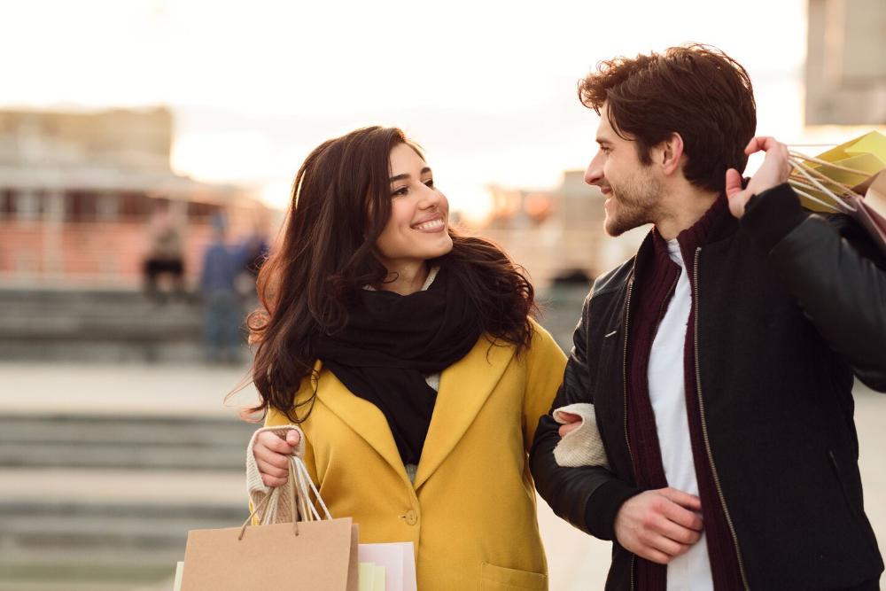 man and woman smiling