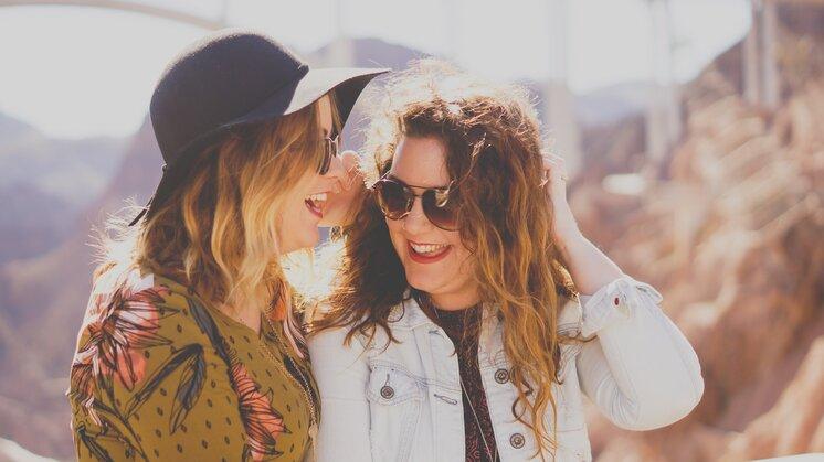 female couple smiling 