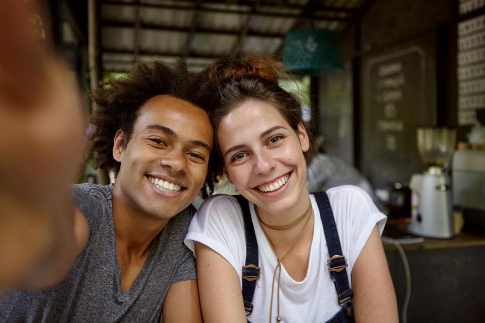 woman and her male partner smiling