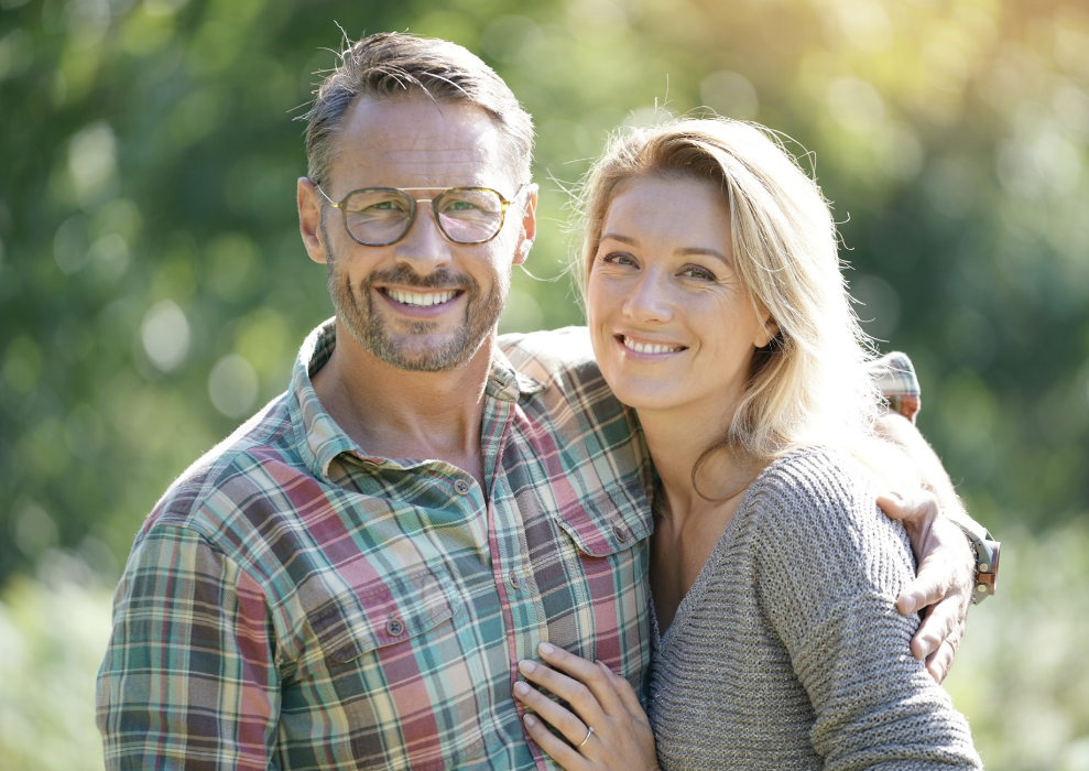 man and woman smiling