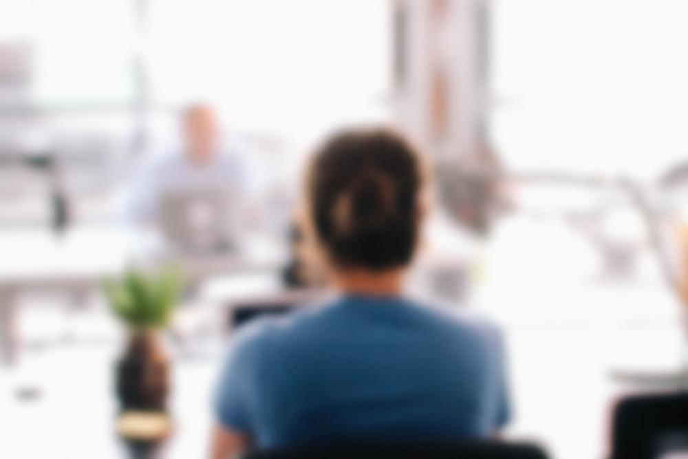 woman sitting in therapy office
