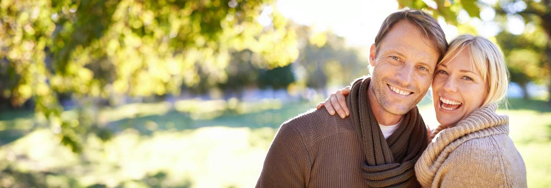 man and woman smiling in kent park