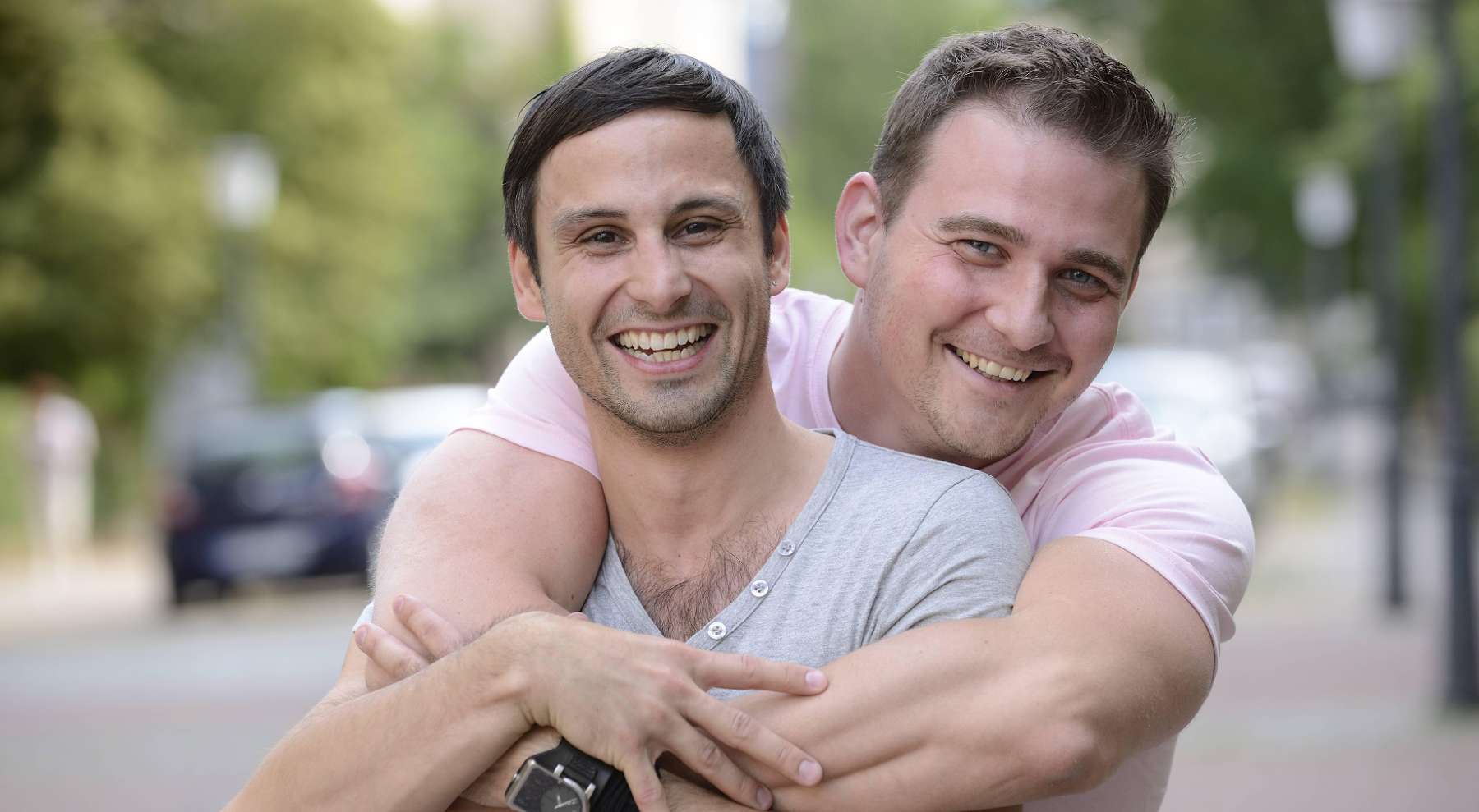 man hugging his male partner's shoulders in federal way
