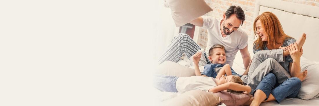 Family having a pillow fight