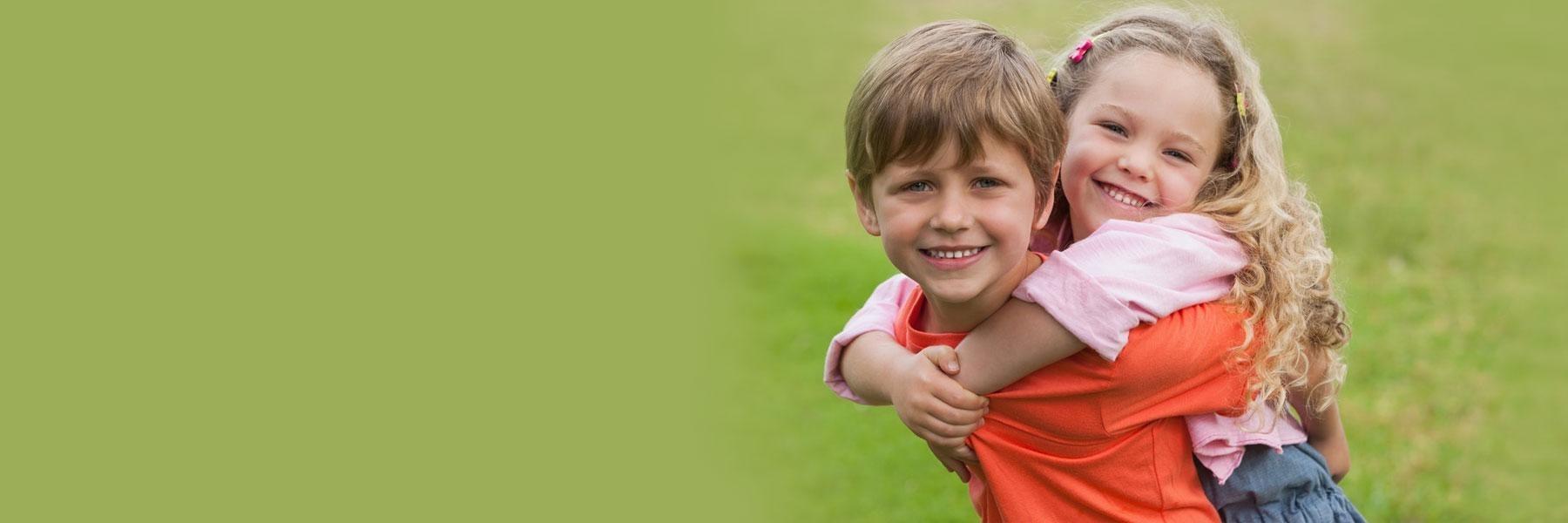 Young boy and girl smiling after counseling in federal way