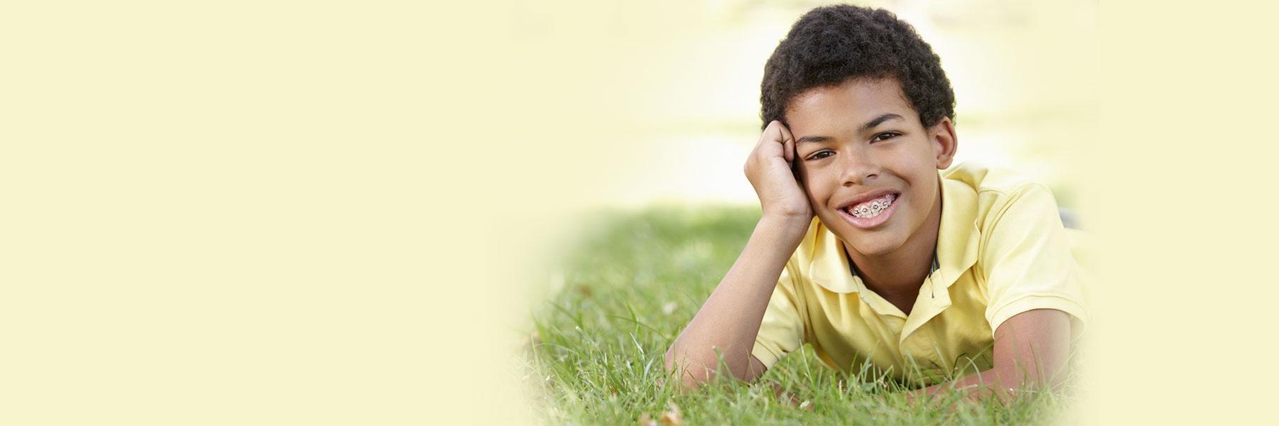 Neurodiverse young boy smiling 
